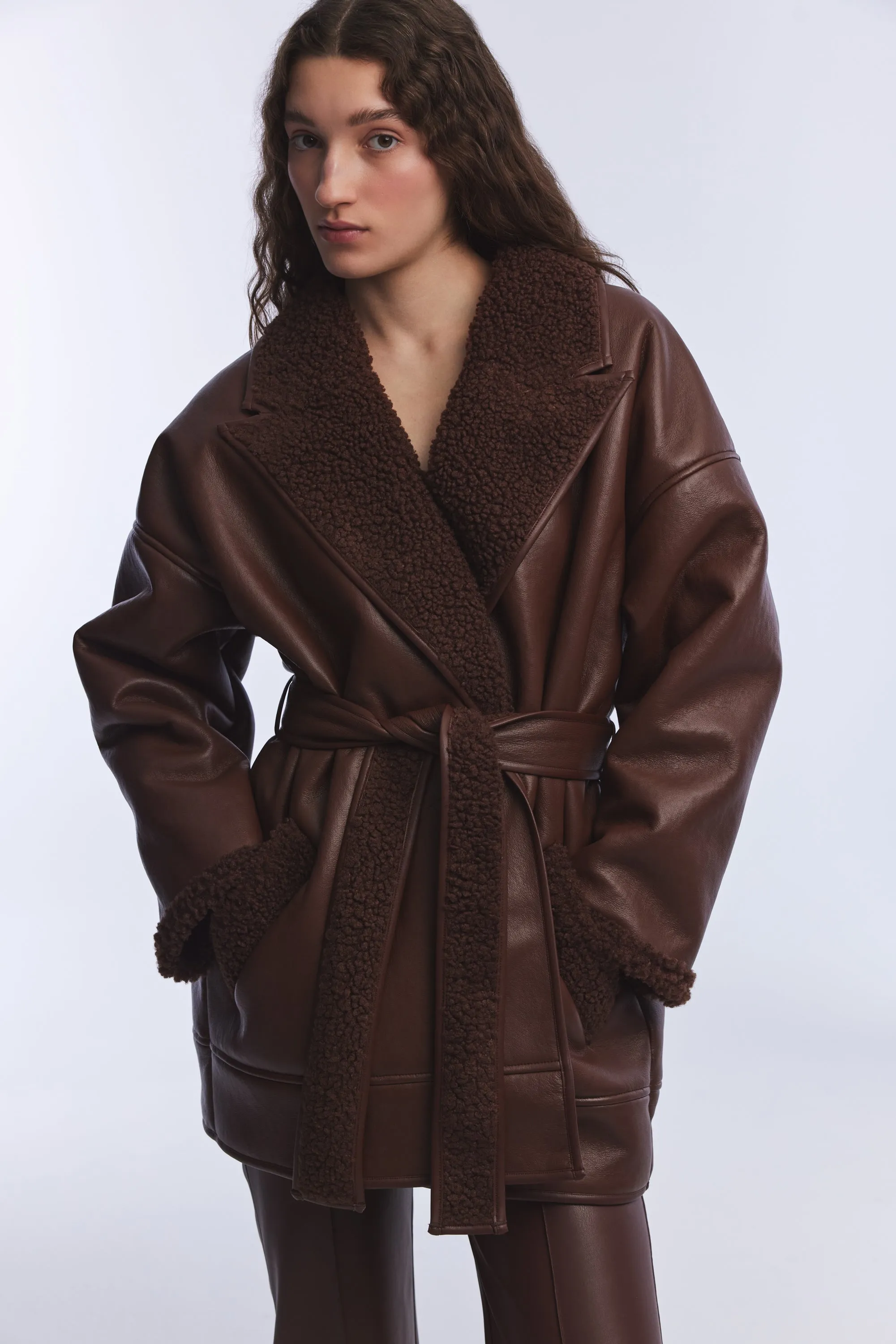 BROWN VEGAN LEATHER TEDDY DETAILED COAT WITH TIE DETAIL